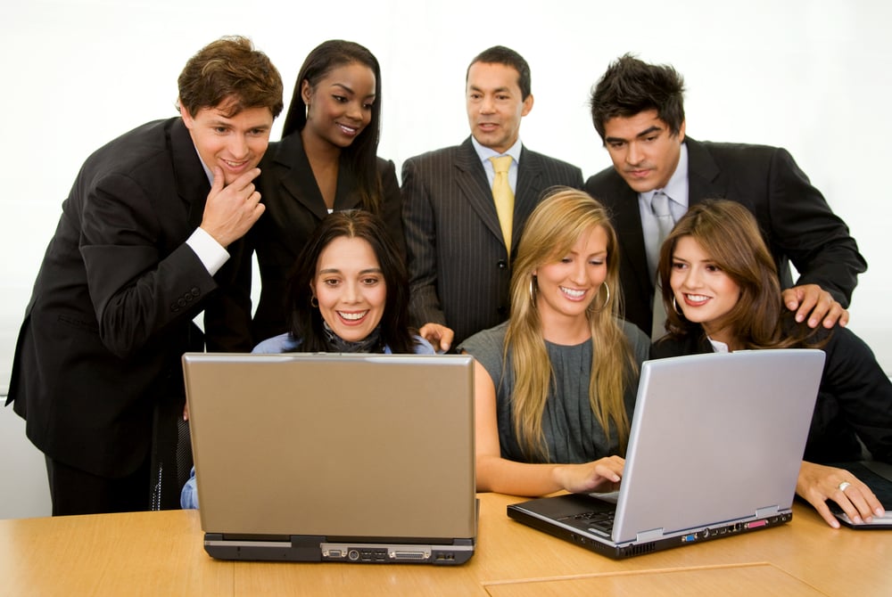 business group of people on laptops in a meeting at the office-1