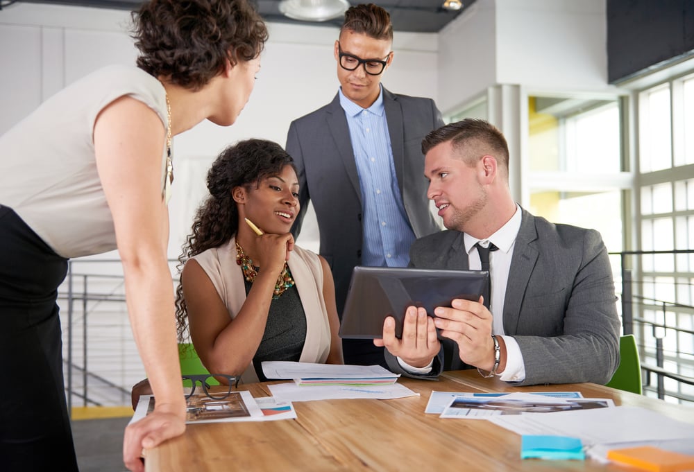 team of successful business people having a meeting in executive sunlit office-2